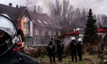 Police prepare to enter buildings to remove activists in the condemned village of Lützerath on January 12.