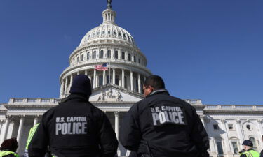 US Capitol police officers gather on the east front plaza of the Capitol in February of 2022 in Washington