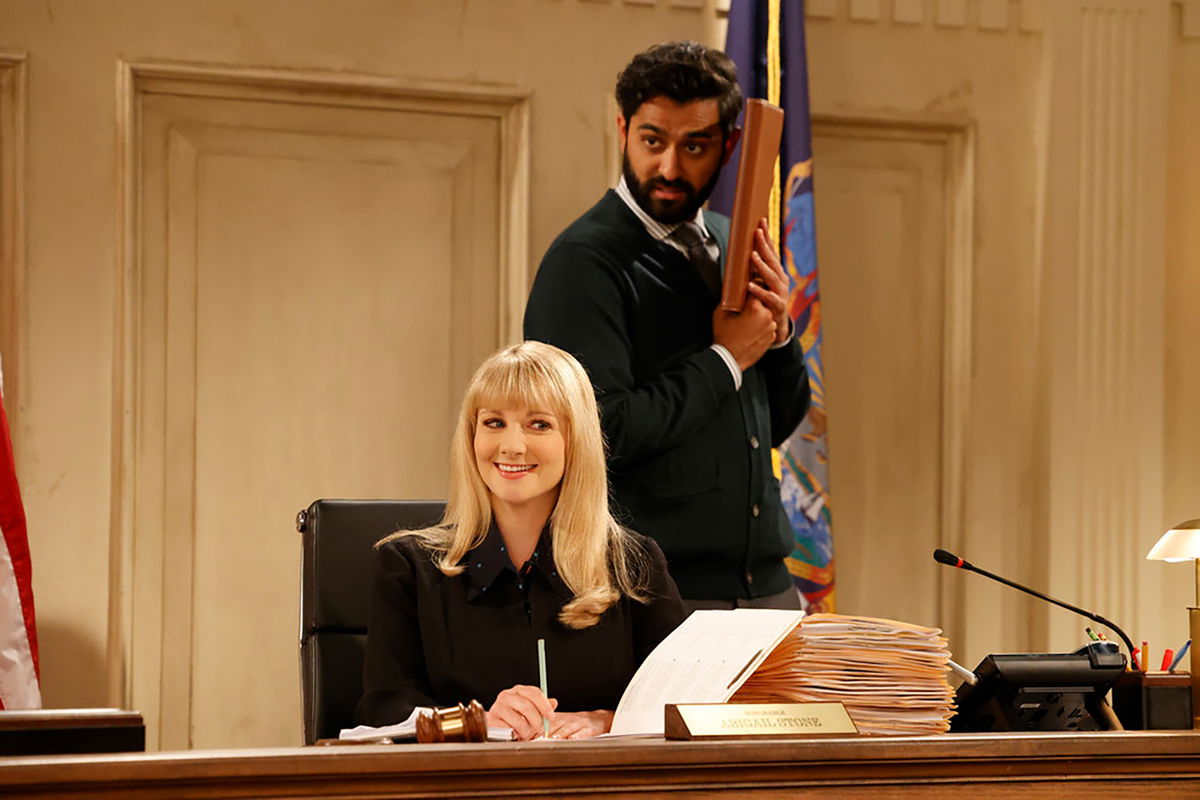 <i>Jordin Althaus/NBC/Warner Bros. Television</i><br/>Melissa Rauch (left) and Kapil Talwalkar are seen here in NBC's revival of 