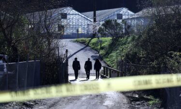 FBI agents arrive at one of two farms where seven people were killed in Half Moon Bay