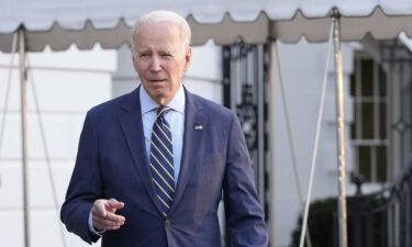 President Joe Biden talks with reporters before he and first lady Jill Biden board Marine One on the South Lawn of the White House in Washington