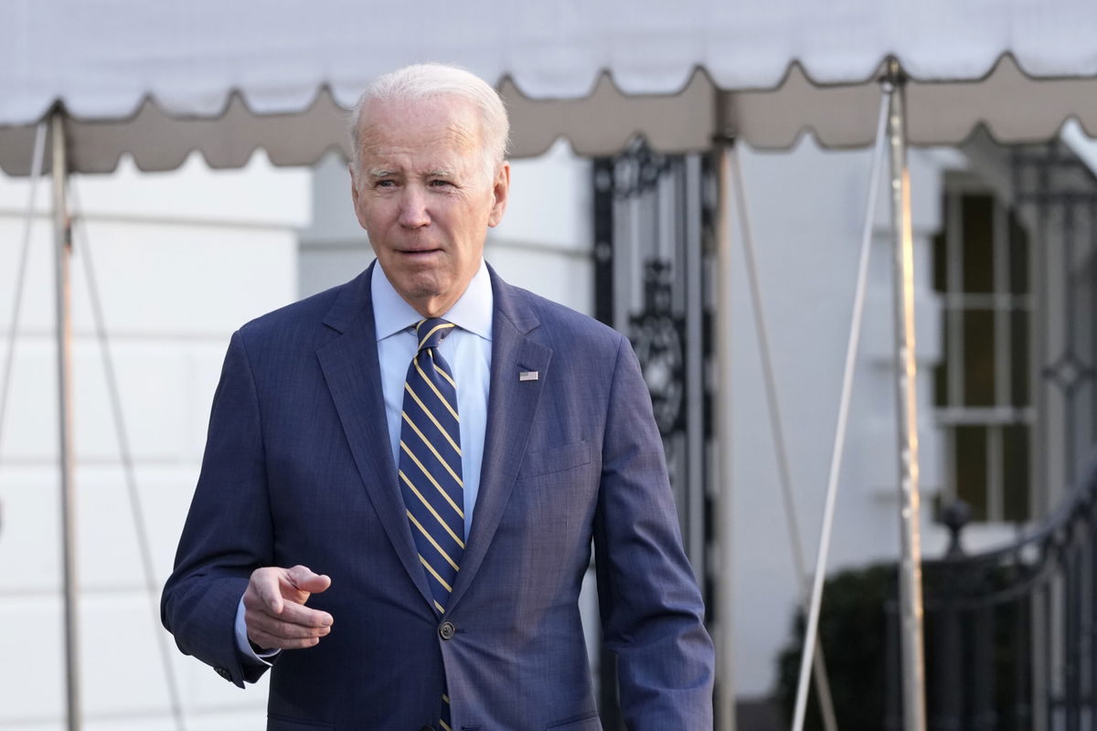 <i>Susan Walsh/AP</i><br/>President Joe Biden talks with reporters before he and first lady Jill Biden board Marine One on the South Lawn of the White House in Washington