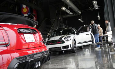 Americans can once again buy cars for less than sticker price. Pictured is a dealership showroom in Highlands Ranch