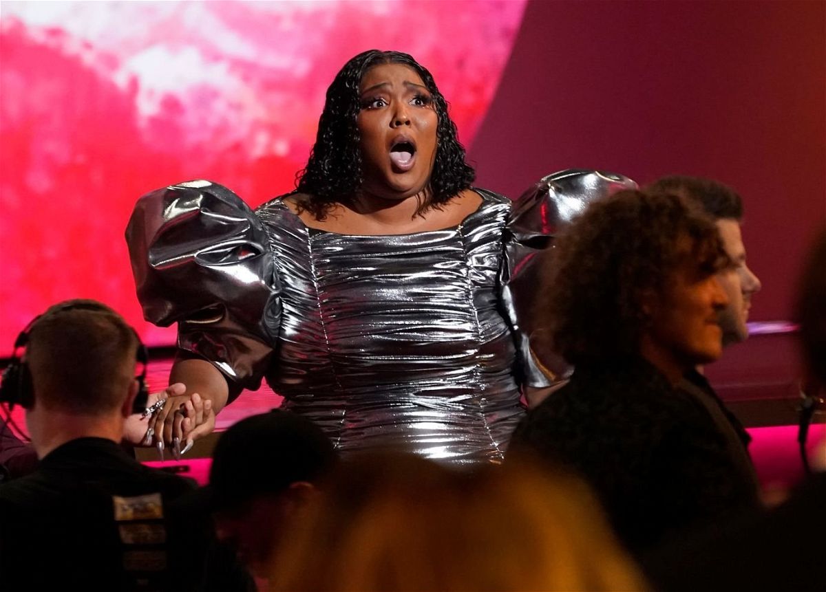 <i>Chris Pizzello/Invision/AP</i><br/>Lizzo reacts after 