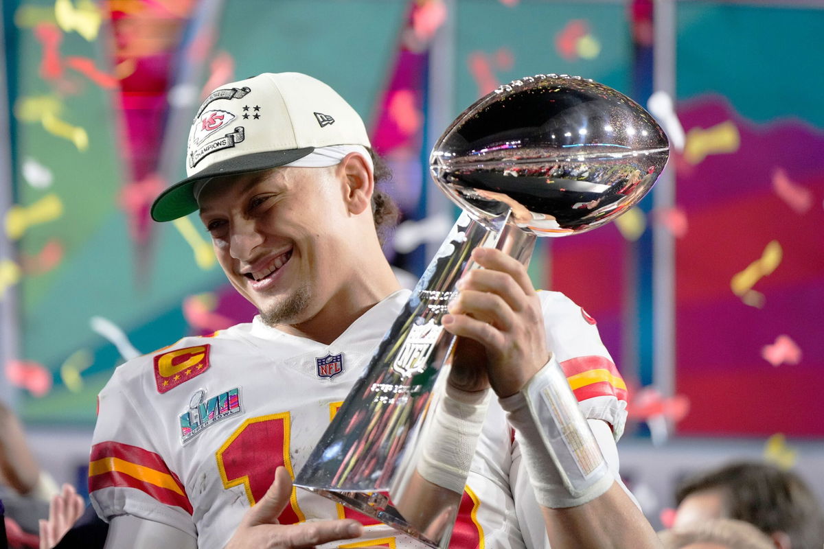 <i>Matt Slocum/AP</i><br/>Patrick Mahomes holds the Lombardi Trophy after winning Super Bowl LVII in Glendale