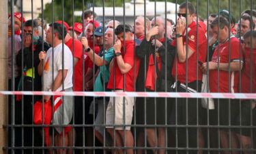 Liverpool fans are seen queuing outside the stadium prior to the UEFA Champions League final match between Liverpool FC and Real Madrid on May 28