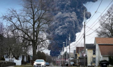 A black plume rises February 6 over East Palestine