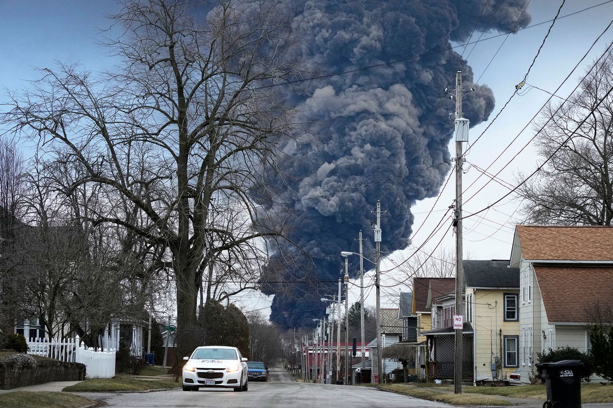 <i>Gene J. Puskar/AP</i><br/>A black plume rises February 6 over East Palestine