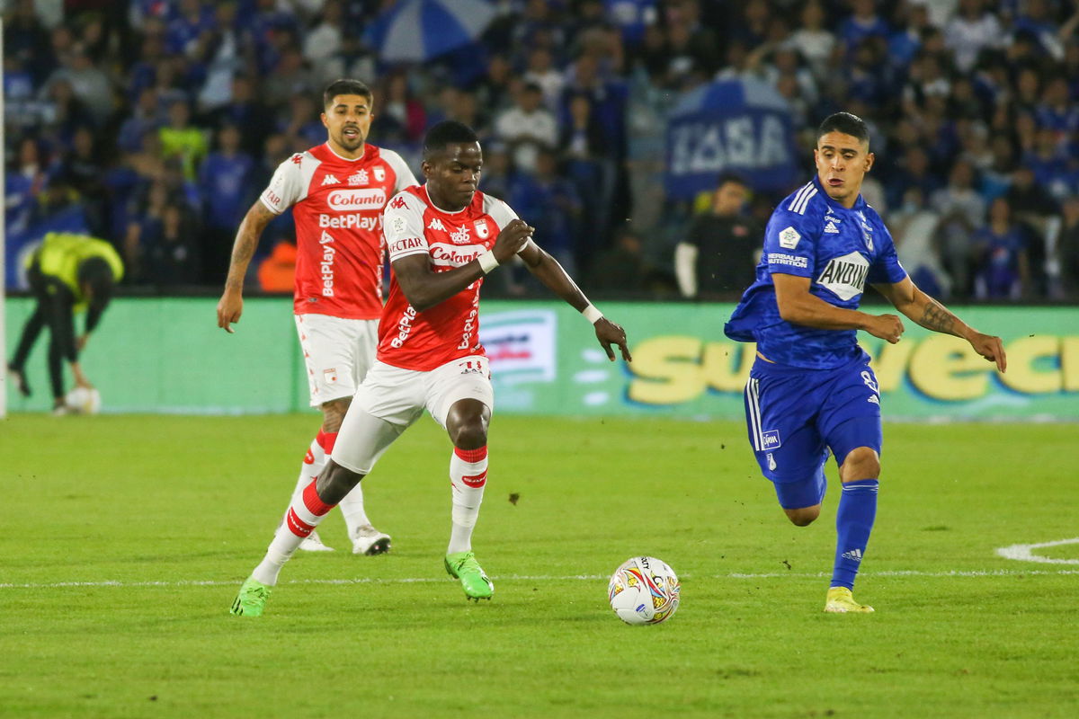 <i>Daniel Garzon Herazo/NurPhoto/Shutterstock</i><br/>Daniel Cataño (in blue) playing for Millonarios in November 2022.