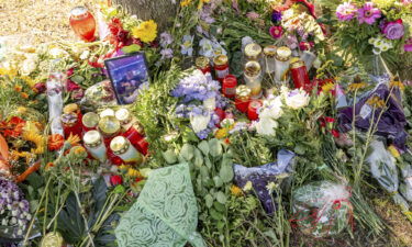 Tributes to the victim pictured on August 23