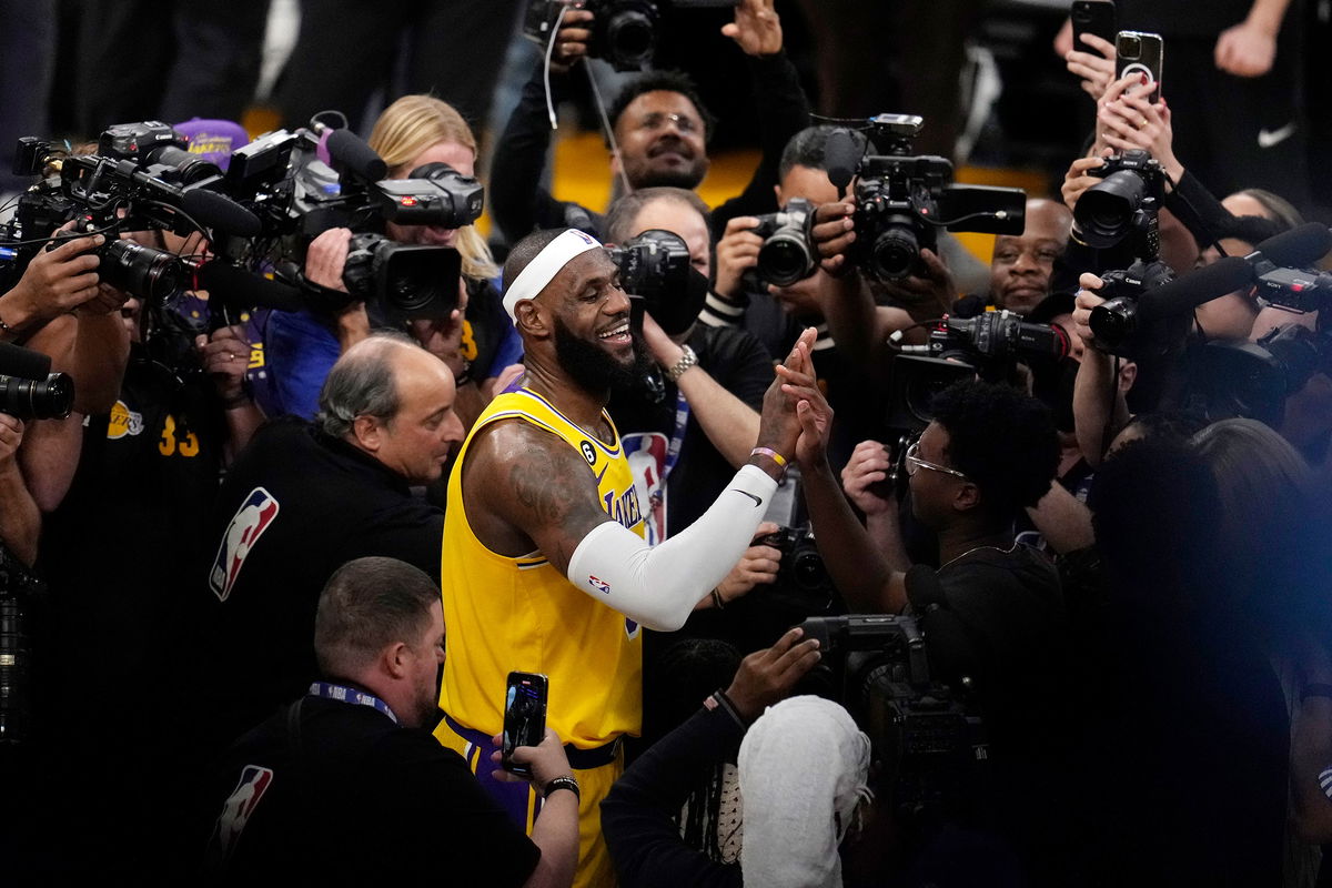 <i>Marcio Jose Sanchez/AP</i><br/>LeBron James after scoring to pass Kareem Abdul-Jabbar's record as the NBA's all-time leading scorer.