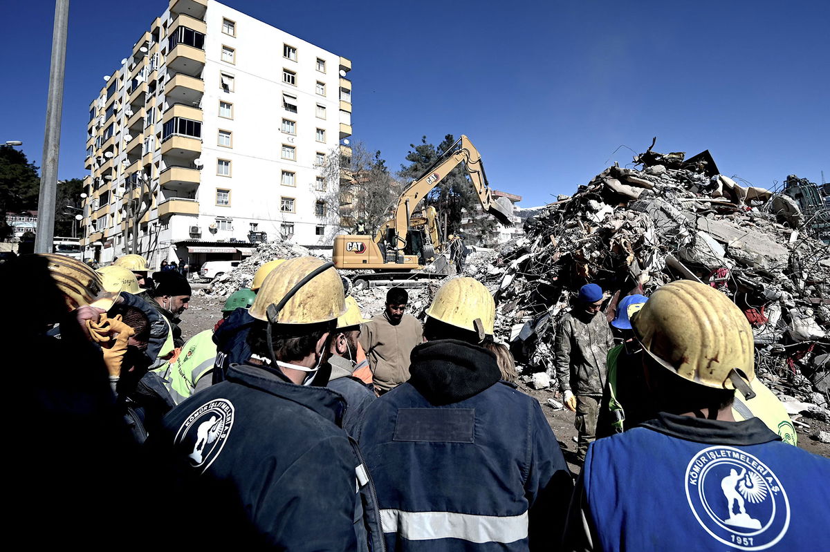 <i>Ozan Kose/AFP/Getty Images</i><br/>Rescue team miners gather after Aleyna Olmez