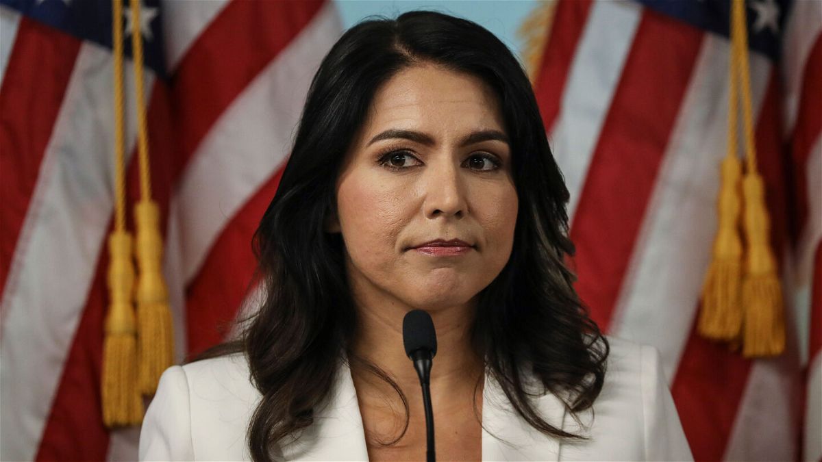 <i>Drew Angerer/Getty Images</i><br/>Then-Rep. Tulsi Gabbard of Hawaii speaks during a news conference in Lower Manhattan on October 29