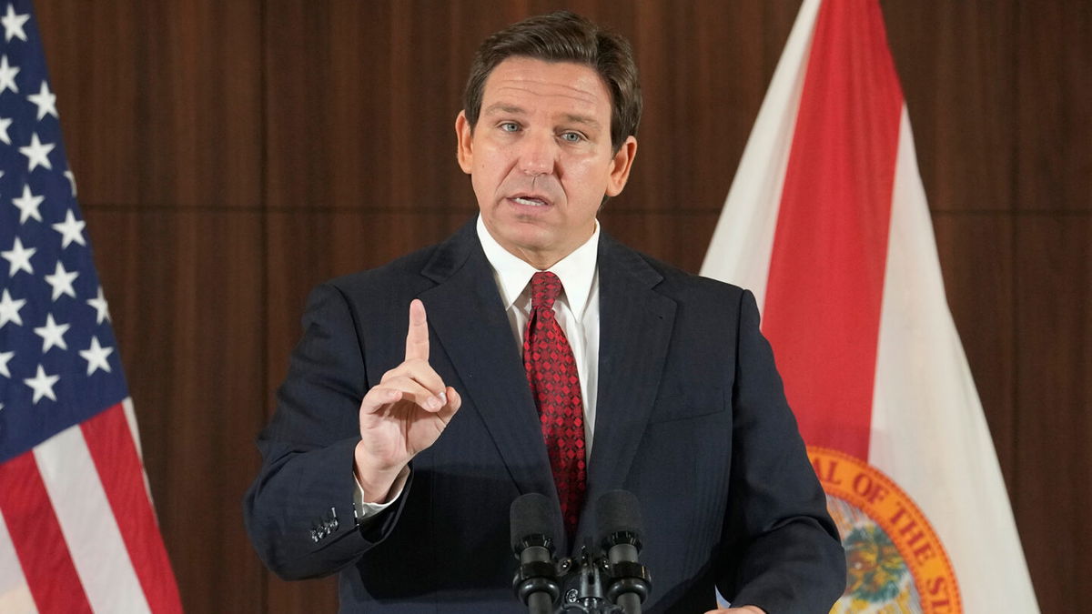 <i>Marta Lavandier/AP</i><br/>Florida Gov. Ron DeSantis gestures during a news conference in Miami on January 26.