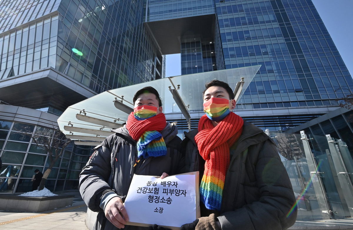 <i>Jung Yeon-Je/AFP/Getty Images</i><br/>A South Korean court on February 21 ruled in favor of a same-sex couple seeking equal health benefits. So Seong-wook and Kim Yong-min