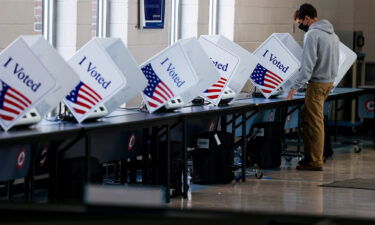 A man votes at a high school in Charleston