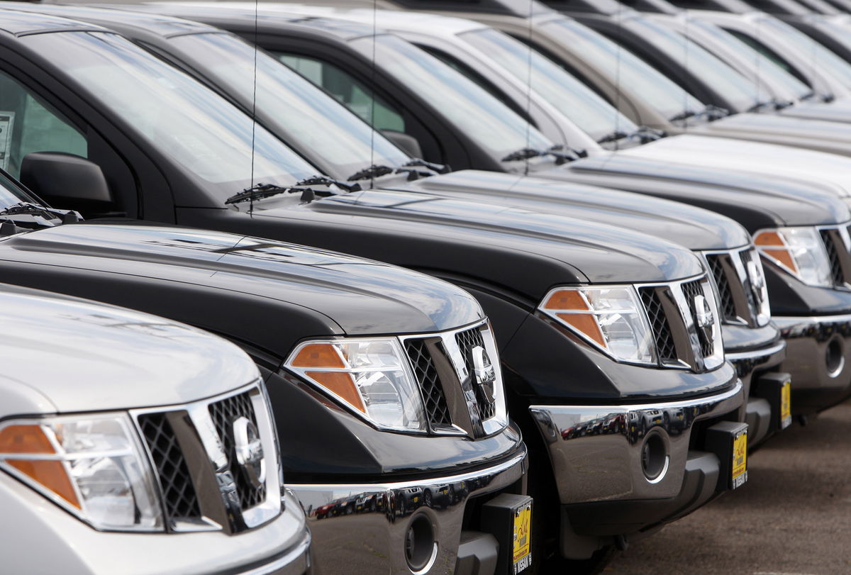 Unsold 2008 Fronter pickup trucks sit at a Nissan dealership in the southeast Denver suburb of Centennial, Colo., on Sunday, June 22, 2008. Nissan Motor Co. on Wednesday, Sept. 3, 2008 said its U.S. auto sales rose in August, lifted by higher volumes of its Frontier truck and Xterra sport utility vehicle. (AP Photo/David Zalubowski)