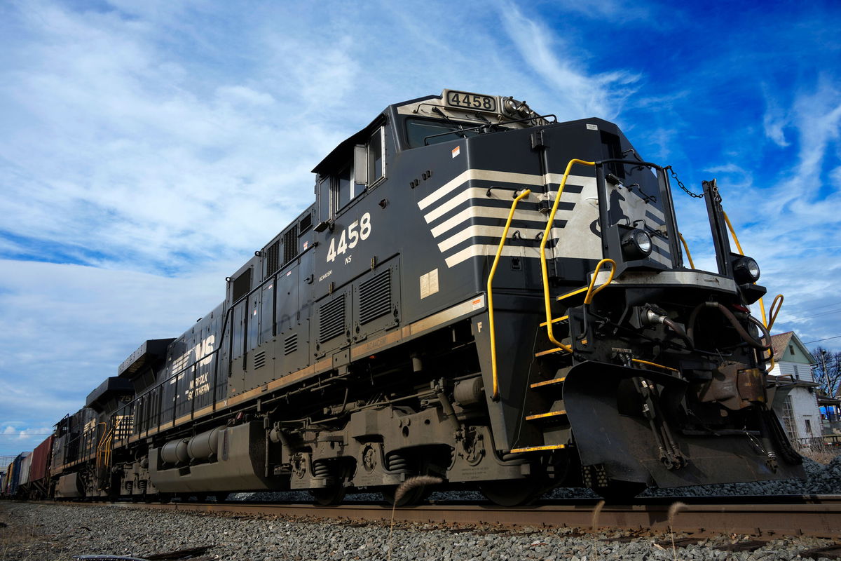 <i>Gene J. Puskar/AP</i><br/>A Norfolk Southern freight train waits to pass through East Palenstine