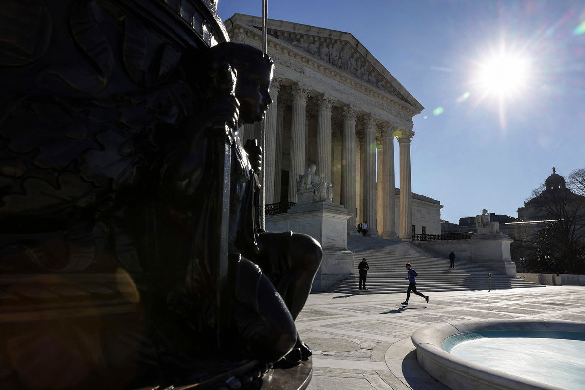 <i>Oliver Contreras/AFP/Getty Images</i><br/>The Supreme Court on Thursday removed oral arguments over Title 42 immigration policy from its calendar.