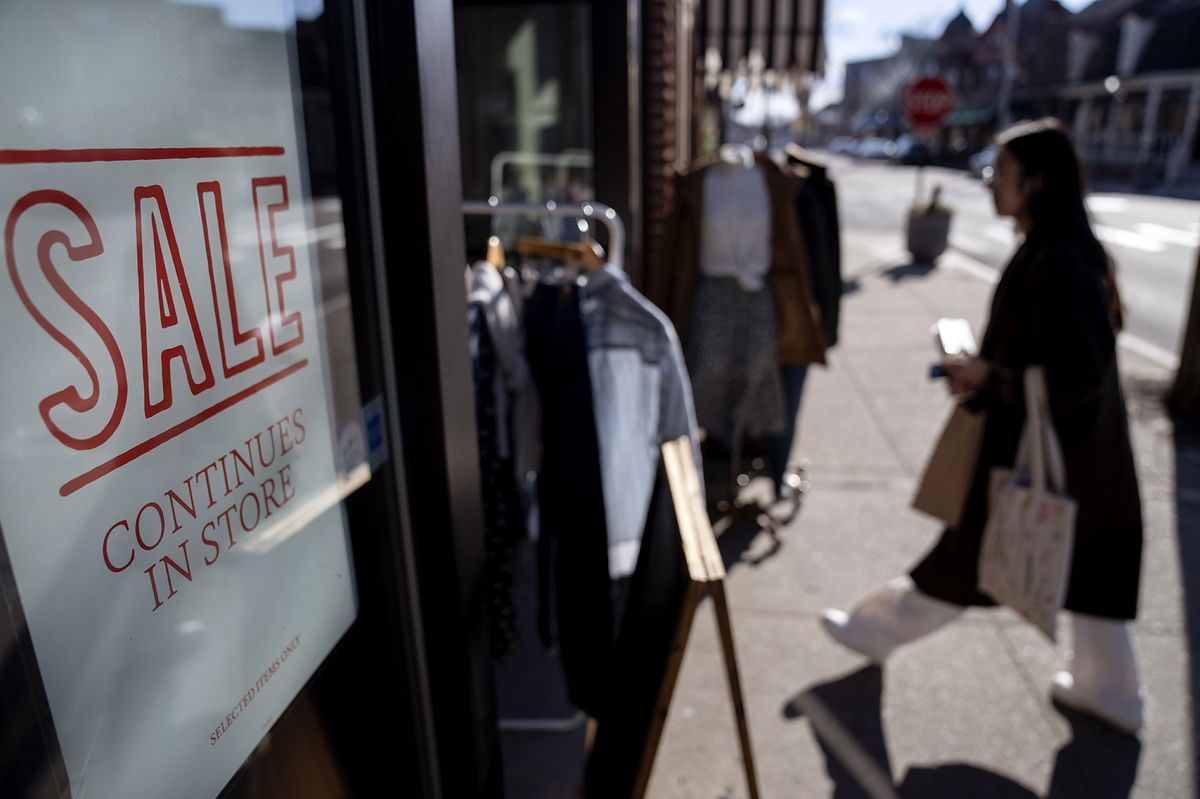 <i>David Goldman/AP</i><br/>US retail sales surged in January. A shop holds a sidewalk sale