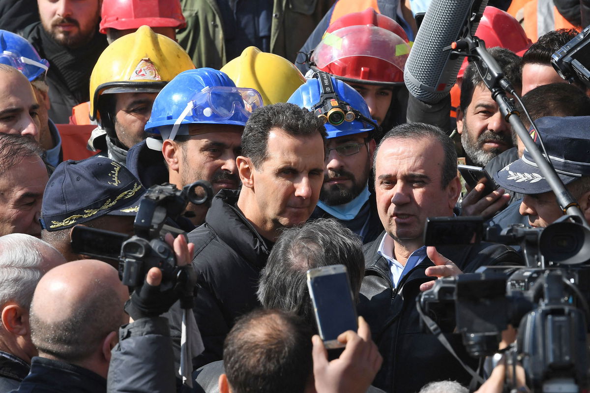 <i>AFP/Getty Images</i><br/>Syrian President Bashar al-Assad (center) visits neighborhoods affected by an earthquake in the northern city of Aleppo