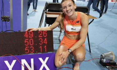 Femke Bol celebrates after winning the women's 400 meters race and beating a 41-year-old world record.