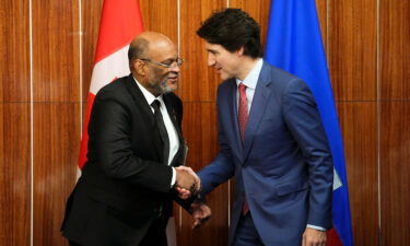 Prime Minister Justin Trudeau (right) takes part in a bilateral meeting with Prime Minister of Haiti Ariel Henry during the Conference of Heads of Government of the Caribbean Community (CARICOM) in Nassau