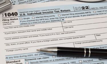 An IRS 1040 tax year 2022 form is pictured here.