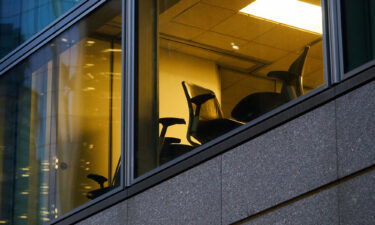 The job market is making traders' heads explode. Pictured are empty office chairs inside Goldman Sachs headquarters in New York