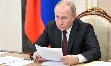 Russia's President Vladimir Putin chairs a meeting on economic issues in Moscow on February 17