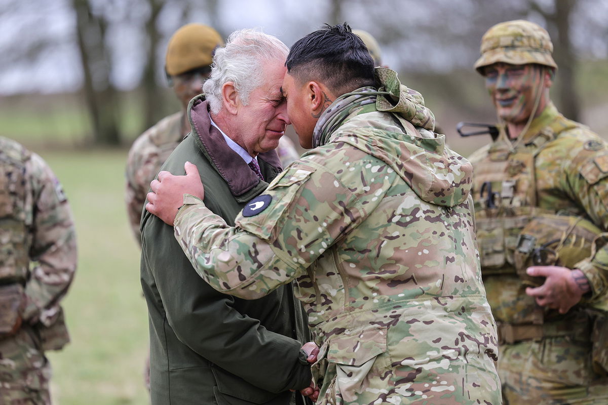 <i>Chris Jackson/WPA Pool/Getty Images</i><br/>The King receives the hongi