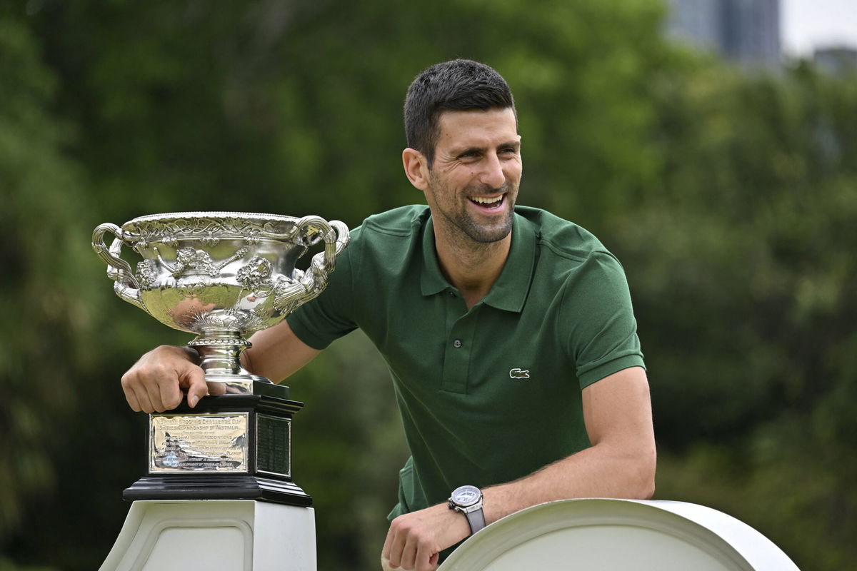 <i>Saeed Khan/AFP/Getty Images</i><br/>Novak Djokovic holds the Norman Brookes Challenge Cup trophy following his Australian Open victory.