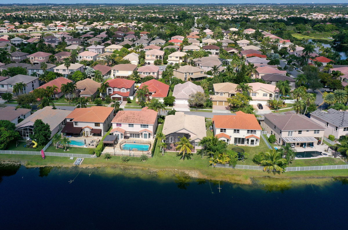 <i>Joe Raedle/Getty Images</i><br/>US home prices fell for the sixth month in a row in December. Pictured is a residential neighborhood on October 27