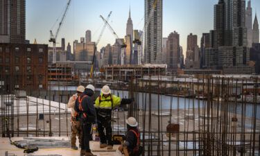 Construction workers are pictured here in Brooklyn on January 24.