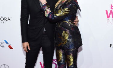 Guy Oseary (left) and Madonna are pictured here at a 2016 Billboard Women In Music event. Oseary said both bought NFTs from Bored Ape Yacht Club.