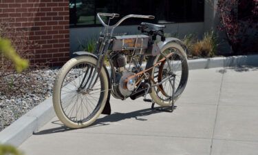 A restored 1908 Harley-Davidson motorcycle has sold for a record $935