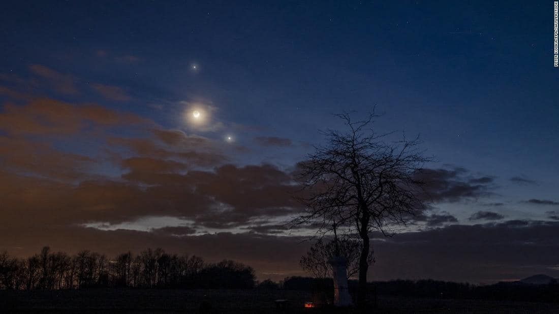 Mandatory Credit: Photo by Peter Komka/EPA-EFE/Shutterstock (13778960e)
Planet Jupiter, the Moon (C) and planet Venus (R) observed on the sky photographed near Salgotarjan, Hungary, late 22 February 2023.
Jupiter, Moon and planet Venus observed near Salgotarjan, Hungary - 22 Feb 2023