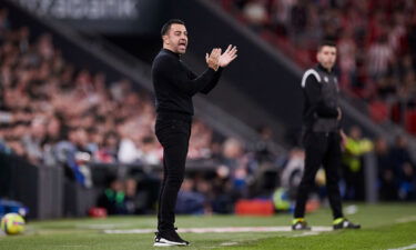 Xavi encourages his Barcelona team against Bilbao.