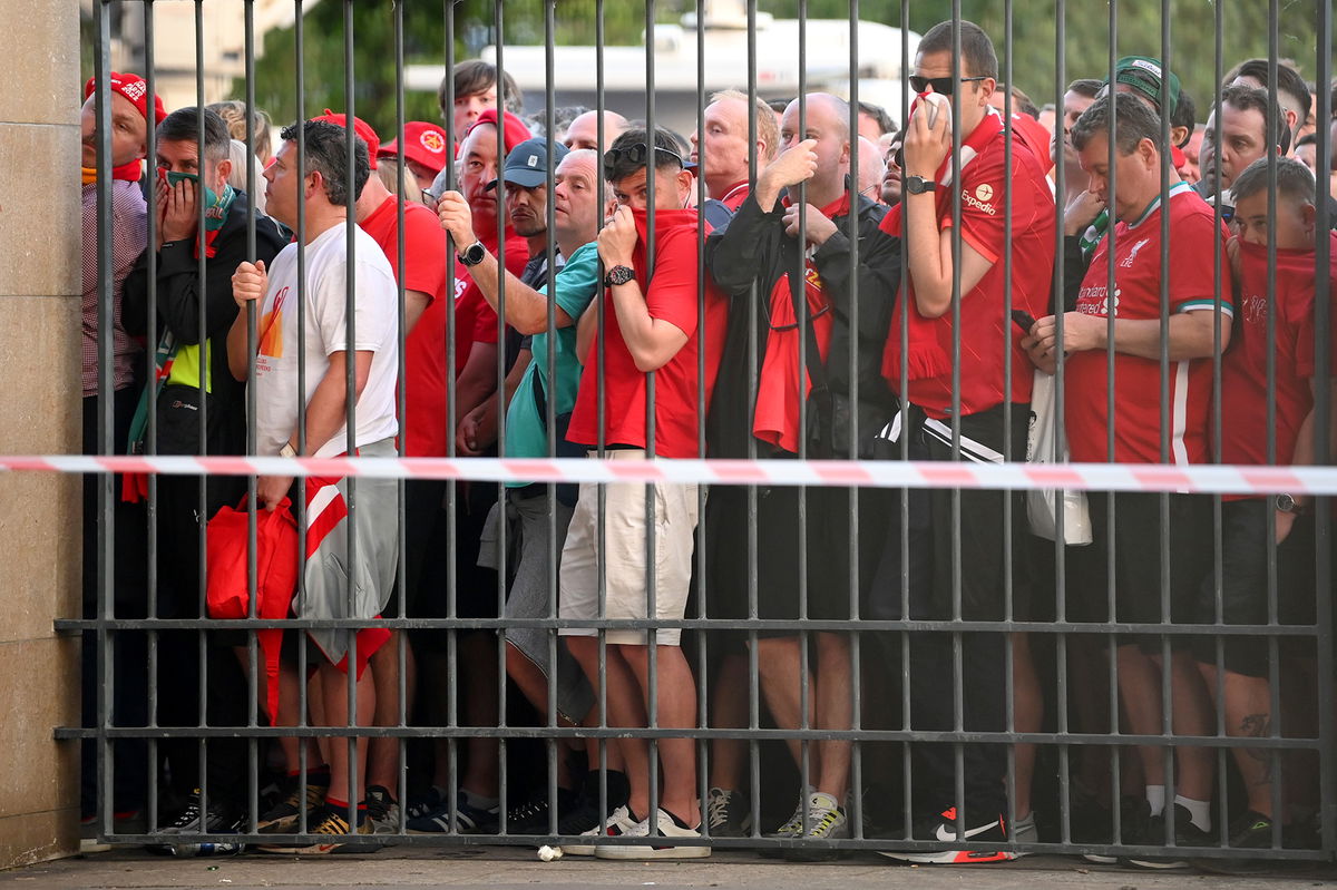 <i>Matthias Hangst/Getty Images</i><br/>Liverpool fans queue outside the Stade de France prior to last year's Champions League final. UEFA plans to refund all Liverpool supporters who had tickets for the 2022 Champions League Final in Paris