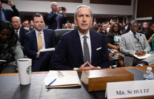 Former Starbucks CEO Howard Schultz arrives to testify about the company's labor and union practices during a Senate Committee on Health