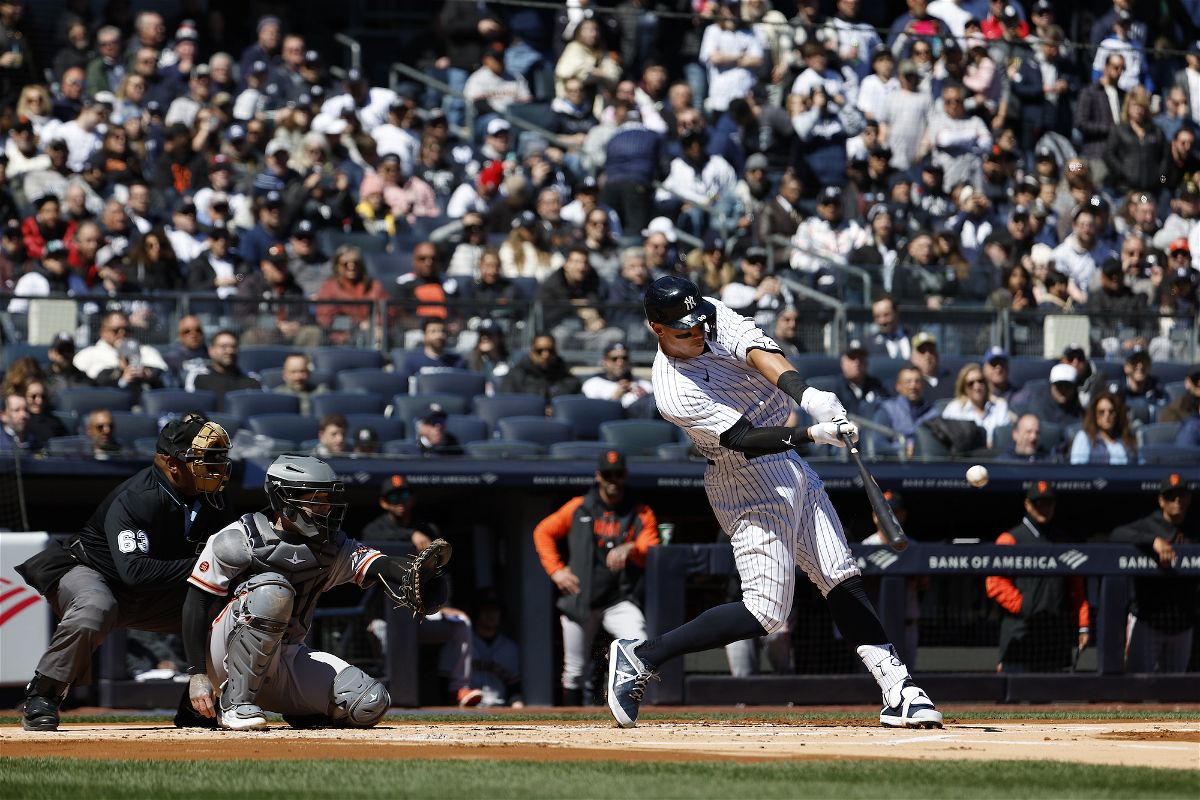 <i>New York Yankees/Getty Images</i><br/>Aaron Judge hits a home run during the first inning against the San Francisco Giants.