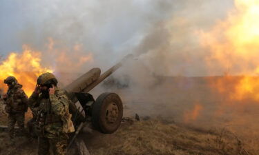 Ukrainian troops fire a D-30 howitzer at Russian positions near Bakhmut