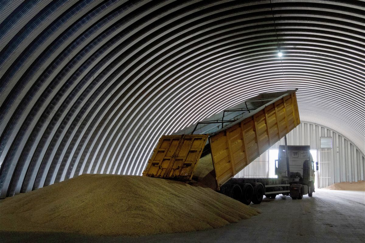 <i>Efrem Lukatsky/AP</i><br/>A dump track unloads grain in a granary in the village of Zghurivka