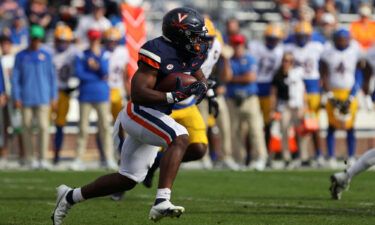 Mike Hollins rushes in the first half during a game at Scott Stadium on November 12