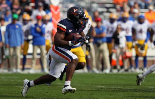 Mike Hollins rushes in the first half during a game at Scott Stadium on November 12