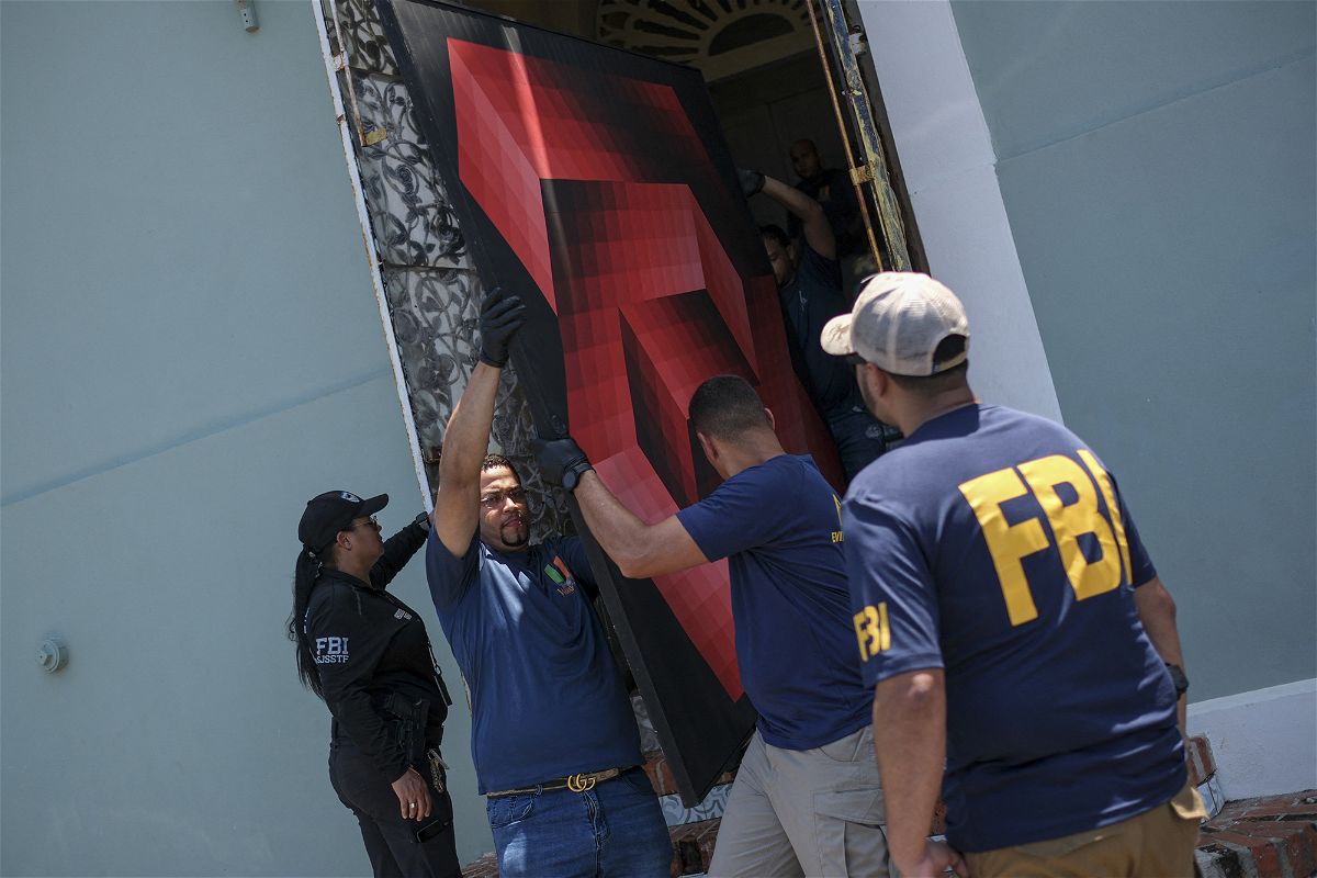 <i>Ricardo Arduengo/AFP/Getty Images</i><br/>French authorities and members of the FBI conduct a raid to recover art at the headquarters of the Michele Vasarely Foundation in San Juan