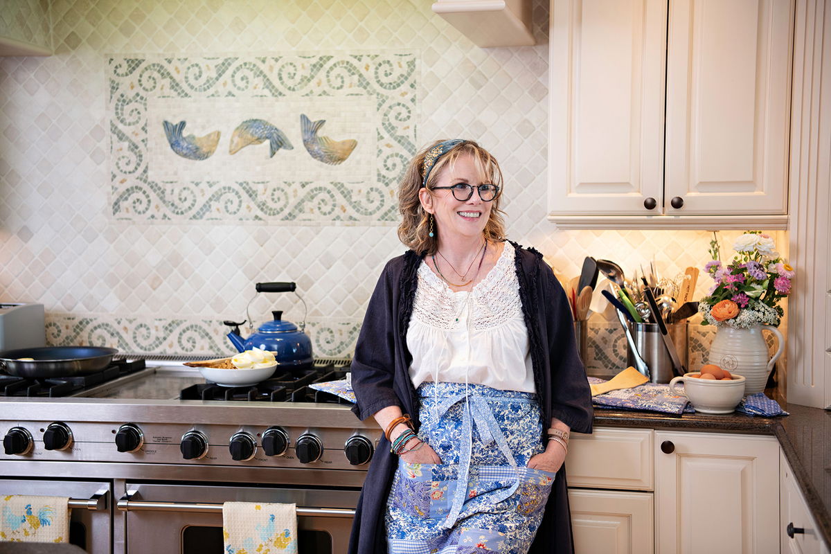 <i>Courtesy Modern Prairie</i><br/>Melissa Gilbert poses in and with items from Modern Prairie's Spring 2023 collections.