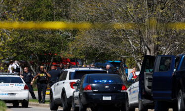 Police work near the scene of the mass shooting at The Covenant School in Nashville on March 27.