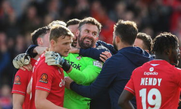 Ben Foster celebrates with his teammates after his dramatic save.