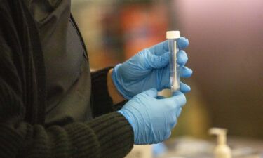 A test swab at a CDC Covid-19 variant testing site inside Tom Bradley International Terminal at Los Angeles International Airport (LAX) is pictured here on January 9.